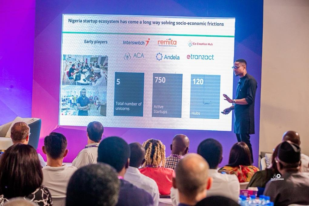 A speaker presenting Africa's startup ecosystem to an audience